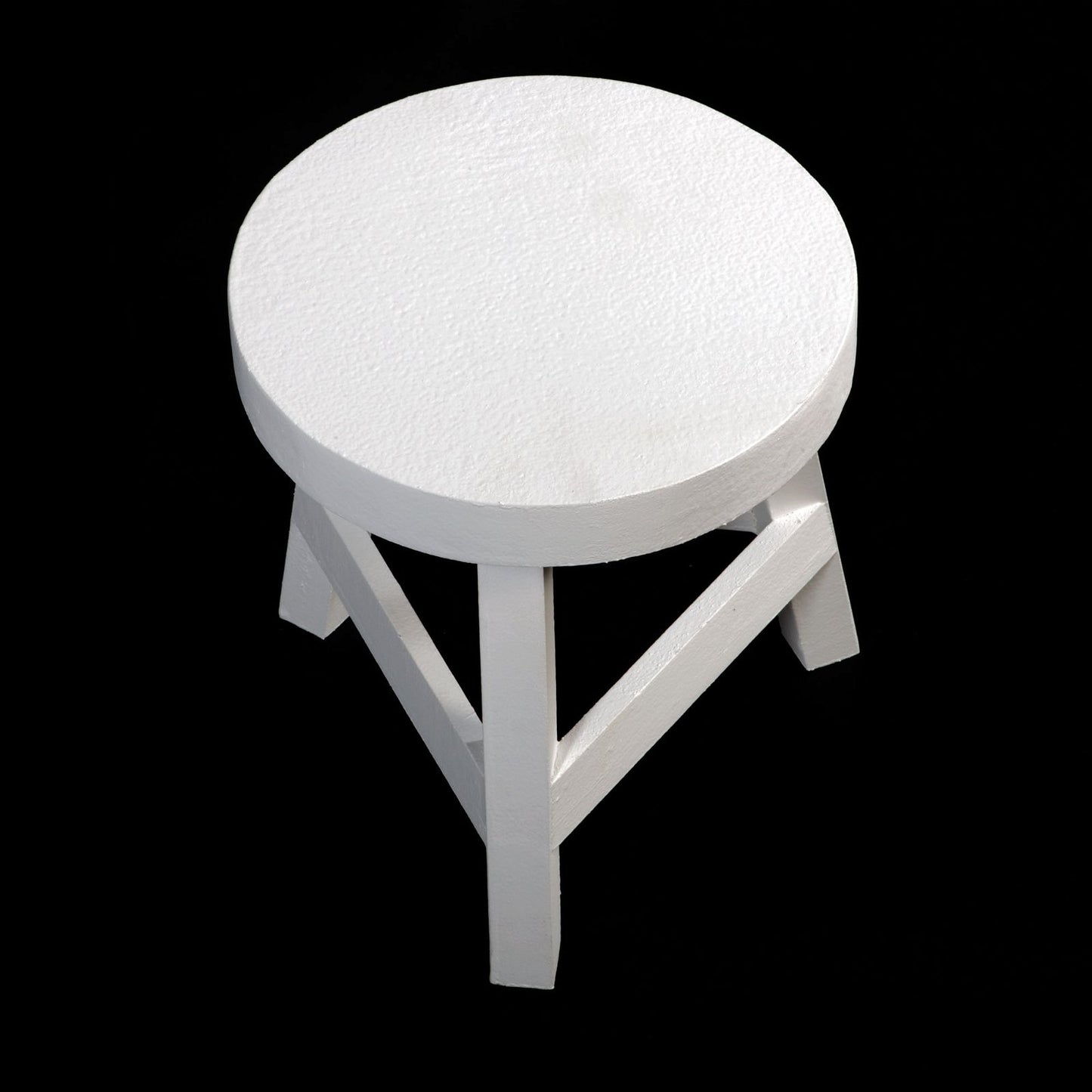 White Three Legged Stool Standing at 23 cm High